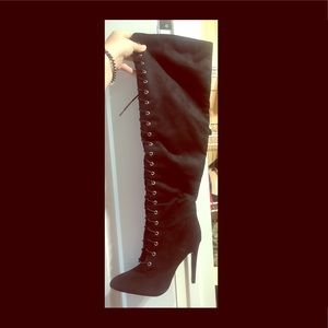 Above the knee black boots